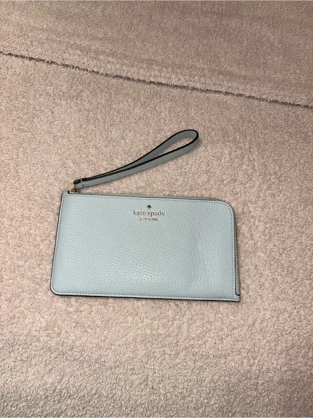 kate spade light blue pebbled leather wristlet phone case